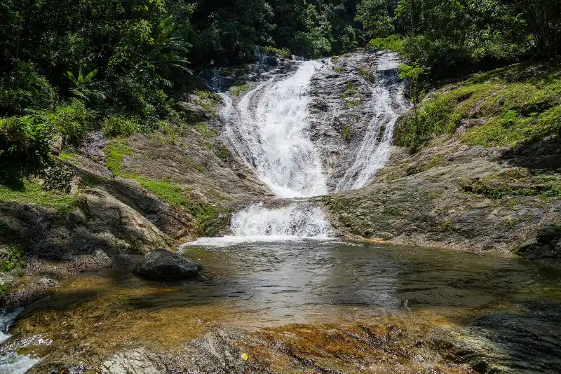 Lata Iskandar waterfall spilling over rock into a pool