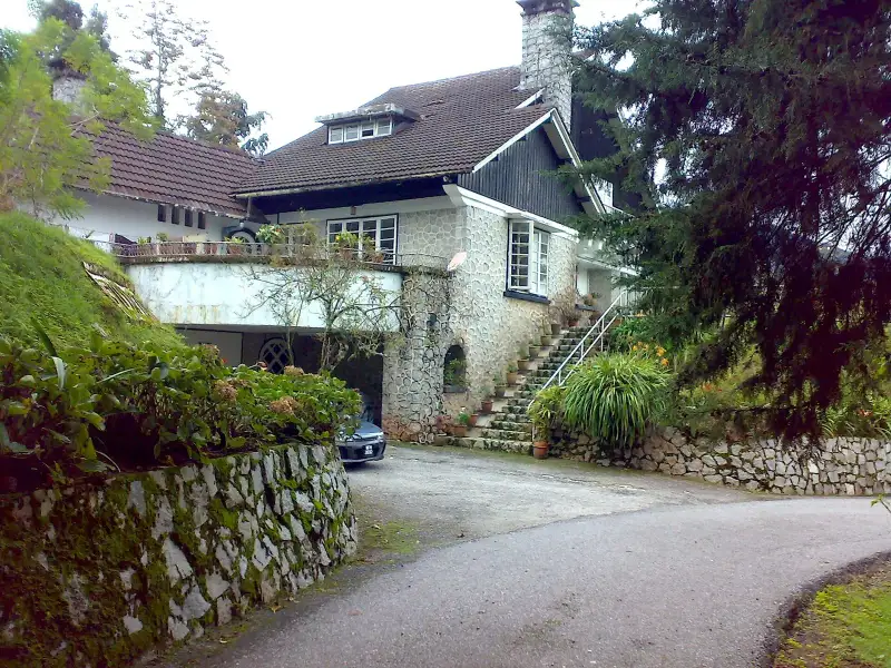 Old bungalow with a stone base and steep roof on Jalan Kamunting, Tanah Rata